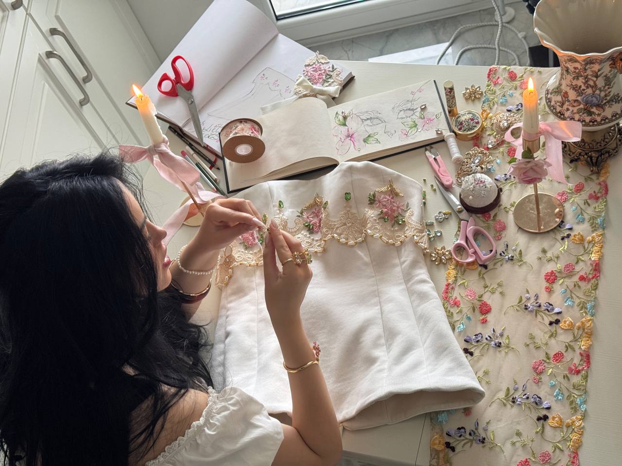 Hand-embroidering a Chérine corset by candlelight